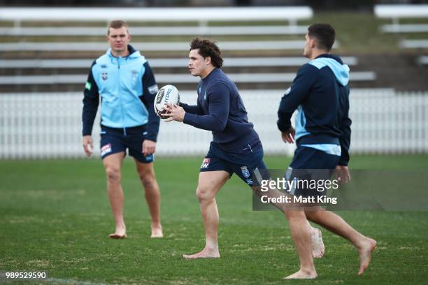 Tom Trbojevic, James Roberts and Nathan Cleary take part in a drill in bare feet during a New South Wales Blues State of Origin Recovery Session at...
