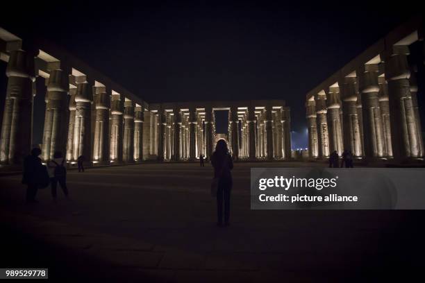 Dpatop - A picture issued on 24 December 2017, shows tourists attending a light show at the Luxor Temple in Luxor, Upper Egypt, 10 December 2017....