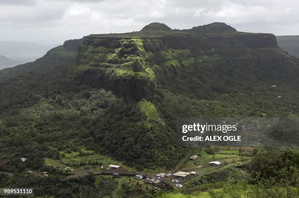 This photo taken on June 30, 2018 shows a flat top hill across from the Lohagad hill fort near Lonavla in the western Indian state of Maharashtra....