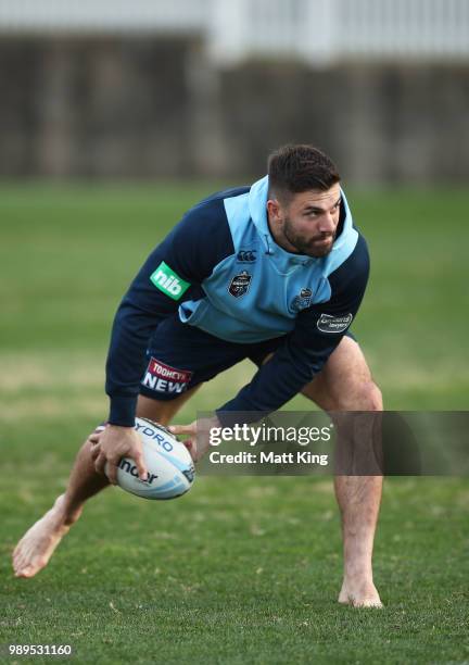 James Tedesco takes part in a drill in bare feet during a New South Wales Blues State of Origin Recovery Session at Coogee Oval on July 2, 2018 in...