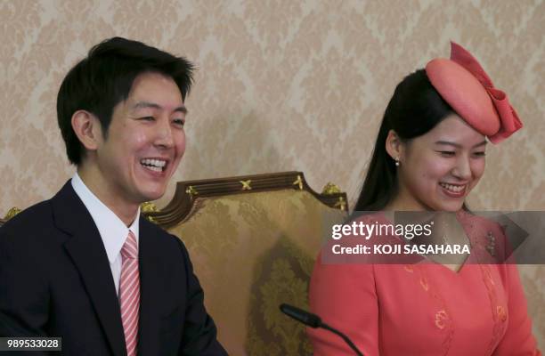 Japanese Princess Ayako , the third daughter of the late Prince Takamado, and her fiance Kei Moriya attend a press conference to announce their...