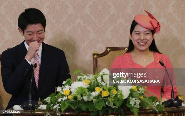 Japanese Princess Ayako , the third daughter of the late Prince Takamado, and her fiance Kei Moriya attend a press conference to announce their...