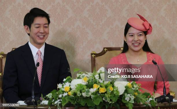 Japanese Princess Ayako , the third daughter of the late Prince Takamado, and her fiance Kei Moriya attend a press conference to announce their...