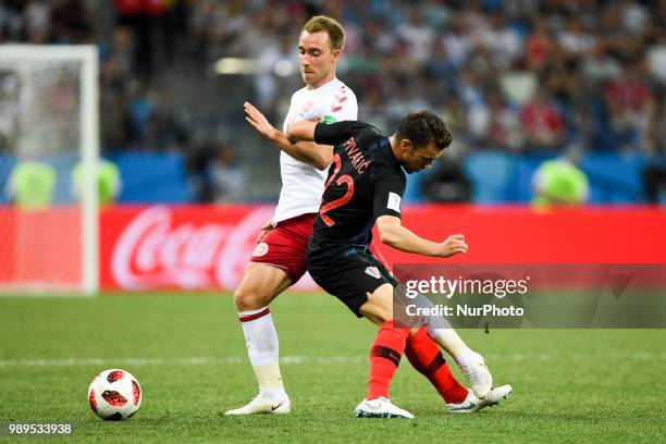 Christian Eriksen of Denmark and Josip Pivaric of Croatia during the 2018 FIFA World Cup Round of 16 match between Croatia and Denmark at Nizhny...