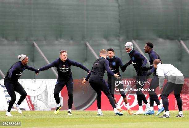 Ashley Young of England, Phil Jones of England, Jesse Lingard of England, Marcus Rashford of England and Danny Welbeck of England take part in a...