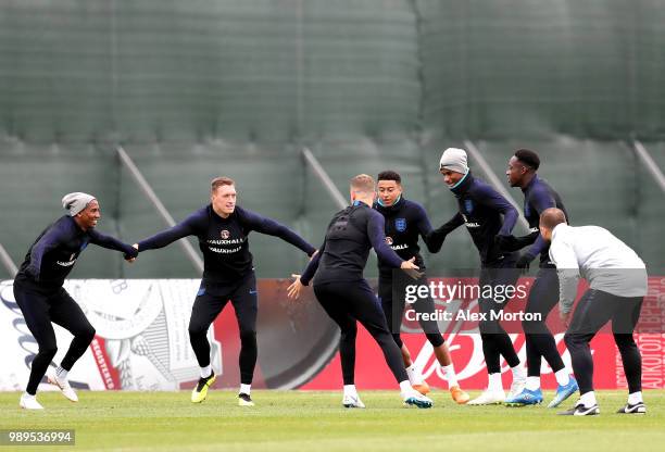 Ashley Young of England, Phil Jones of England, Jesse Lingard of England, Marcus Rashford of England and Danny Welbeck of England take part in a...