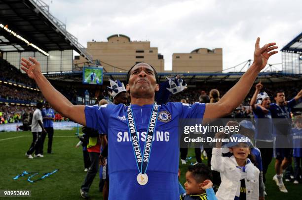 Chelsea's Florent Malouda celebrates after winning the league with an 8-0 victory during the Barclays Premier League match between Chelsea and Wigan...