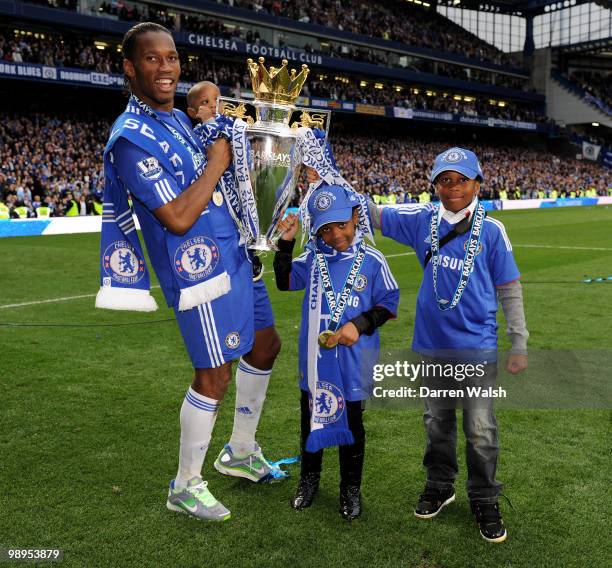Chelsea's hat trick hero Didier Drogba celebrates after winning the league with an 8-0 victory during the Barclays Premier League match between...