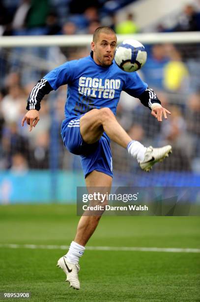 Joe Cole of Chelsea controls the ball in the pre match warm up during the Barclays Premier League match between Chelsea and Wigan Athletic at...