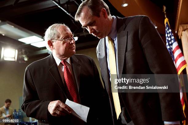 Sen. Carl Levin and Sen. Jeff Merkley leave after a press conference on Capitol Hill May 10, 2010 in Washington, DC. Levin and Merkley held the press...