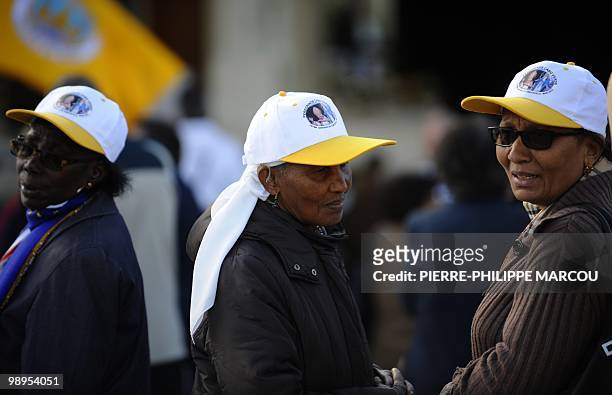 Women from Cape Verde stand at the entrance of the Chapel of the apparitions at Fatima's Sanctuary on May 10, 2010. Pope Benedict XVI will visit...