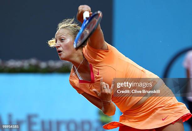 Petra Kvitova of Czech Republic serves against Caroline Wozniacki of Denmark in their first round match during the Mutua Madrilena Madrid Open tennis...