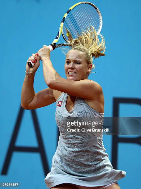 Caroline Wozniacki of Denmark in action against Petra Kvitova of Czech Republic in their first round match during the Mutua Madrilena Madrid Open...