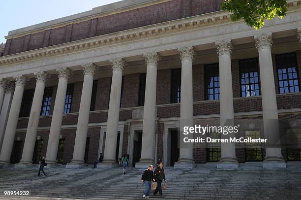 People walk outside the Widener Library in Harvard Yard on May 10, 2010 in Cambridge, Massachusetts. U.S. President Barack Obama announced today the...