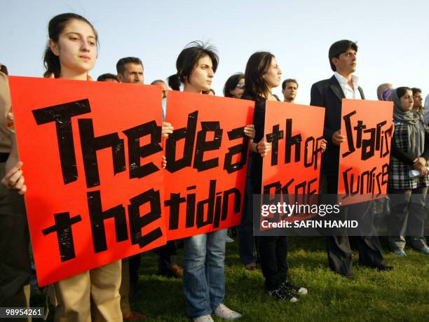 Iranian Kurds protest in the northern Iraqi Kurdish city of Arbil on May 10, 2010 against the killing of Five Kurdish rebels, including two women,...