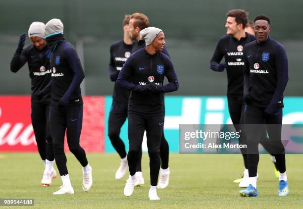Ashley Young of England speaks to Danny Welbeck of England during the England training session at the Stadium Spartak Zelenogorsk on July 2, 2018 in...