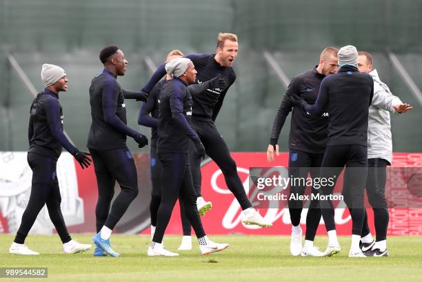 Harry Kane of England, Raheem Sterling of England, Ashley Young of England , Danny Welbeck of England and Eric Dier of England react during the...