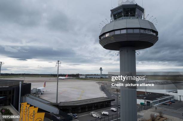 The tower stands in front of the cargo area at the Hanover Airport in Hanover, Germany, 27 December 2017. For months the Chinese post prepared its...