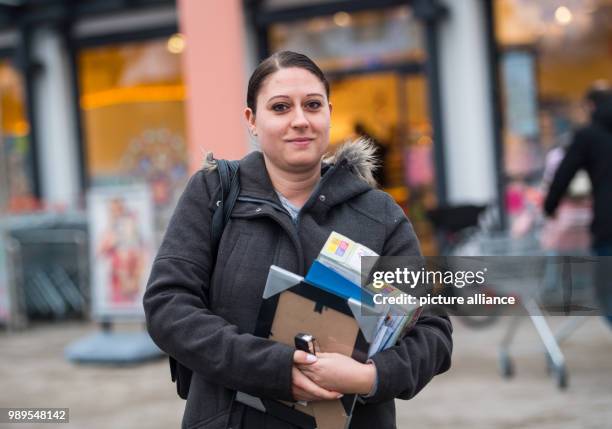 Diana Jaeger stands in front of the drugstore where a 15-year-old was killed in Kandel, Germany, 27 December 2017. Jaeger was in the drugstore during...