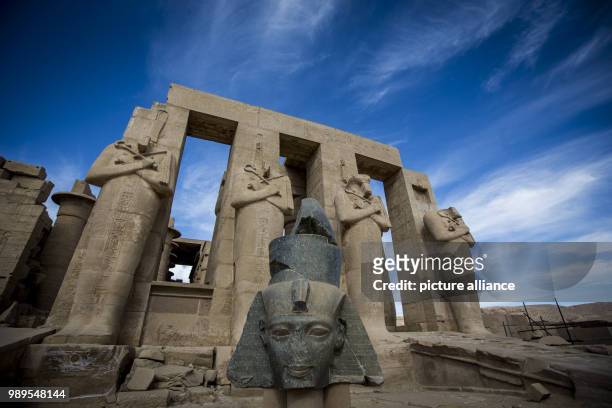 Picture provided on 28 December 2017 shows the Colossal statues of Rameses II at the entrance of Ramesseum Temple, the memorial temple of Pharaoh...