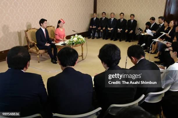 Princess Ayako of Takamado and her fiance Kei Moriya attend a press conference at the Imperial Household Agency on July 2, 2018 in Tokyo, Japan. The...