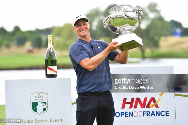 Alex NOREN of Sweden lifts the trophy after winning the HNA French Open on July 1, 2018 in Saint-Quentin-en-Yvelines, France.