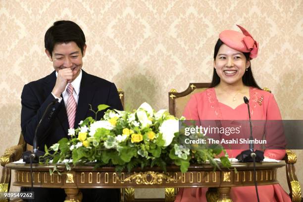 Princess Ayako of Takamado and her fiance Kei Moriya attend a press conference on their engagement at the Imperial Household Agency on July 2, 2018...