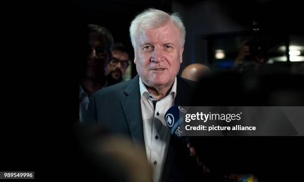 July 2018, Germany, Munich: Leader of the Christian Social Union and Minister for Domestic Affairs and Infrastructure, Horst Seehofer, leaving a CSU...