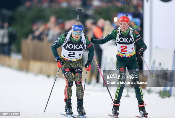 German biathletes Erik Lesser and Franziska Hildebrand in action during the the 16th Biathlon World Team Challenge in the Veltins Arena in...