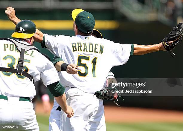 Dallas Braden of the Oakland Athletics celebrates after pitching a perfect game against the Tampa Bay Rays during an MLB game at the Oakland-Alameda...