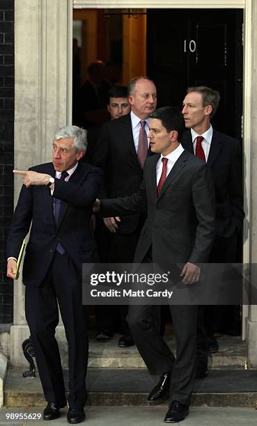 Justice Secretary Jack Straw and Foreign Secretary David Milliband leave Downing Street following a cabinet meeting on May 10, 2010 in London,...