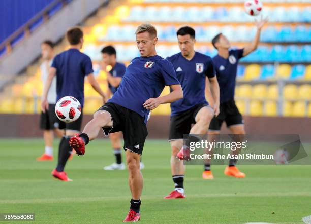 Keisuke Honda of Japan warms up during the Japan training ahead of the Round of 16 match against Belgium on July 1, 2018 in Rostov-on-Don, Russia.