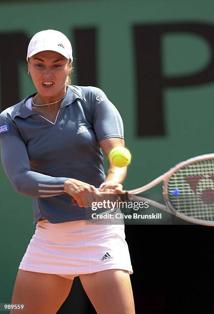 Martina Hingis of Switzerland returns in her first round match against Gala Leon Garcia of Spain during the French Open Tennis at Roland Garros,...