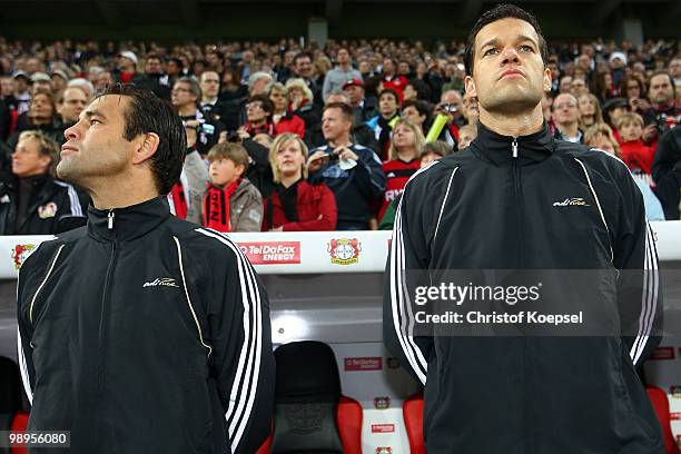 Ulf Kirsten and Michael Ballack of Schnix All Stars stand on the bench during the Bernd Schneider farewell match between Bayer Leverkusen and Schnix...