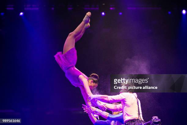 ArtCore performing acrobatics at the "Feuerwerk der Turnkunst" event at the EWE-Arena in Oldenburg, Germany, 29 December 2017. Photo: Mohssen...