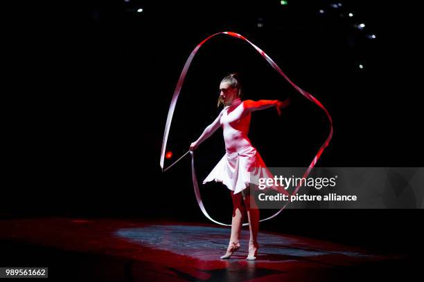 Daniela Potapova performing rhythmic gymnastics at the "Feuerwerk der Turnkunst" event at the EWE-Arena in Oldenburg, Germany, 29 December 2017....