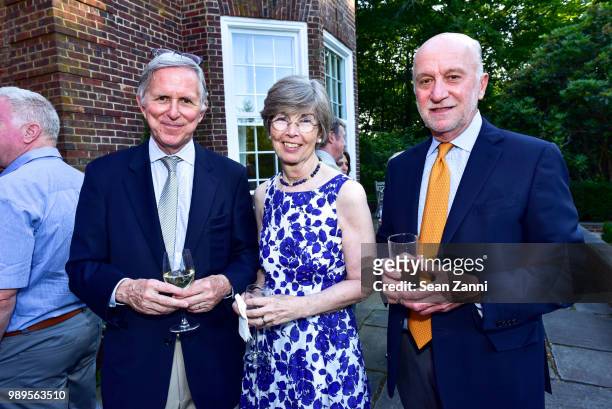 Sam White, Elizabeth White and John Casaly attend A Country House Gathering To Benefit Preservation Long Island At The Edwin Gould Estate "Highwood"...