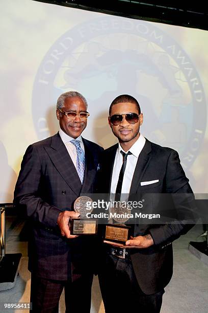 Ed Lewis, Founder and Chairman Emeritus, Essence Magazine, who accepted on behalf of the John H. Johnson family, and Usher, Scholar, pose with awards...