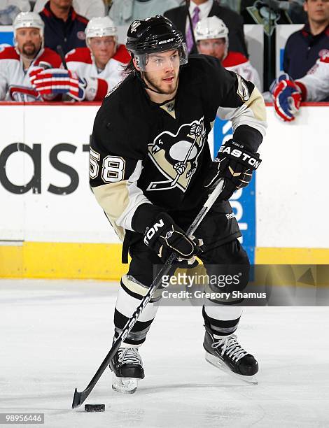 Kris Letang of the Pittsburgh Penguins looks to pass against the Montreal Canadiens in Game Five of the Eastern Conference Semifinals during the 2010...