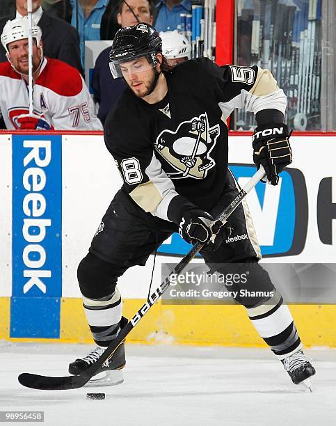Kris Letang of the Pittsburgh Penguins controls the puck against the Montreal Canadiens in Game Five of the Eastern Conference Semifinals during the...
