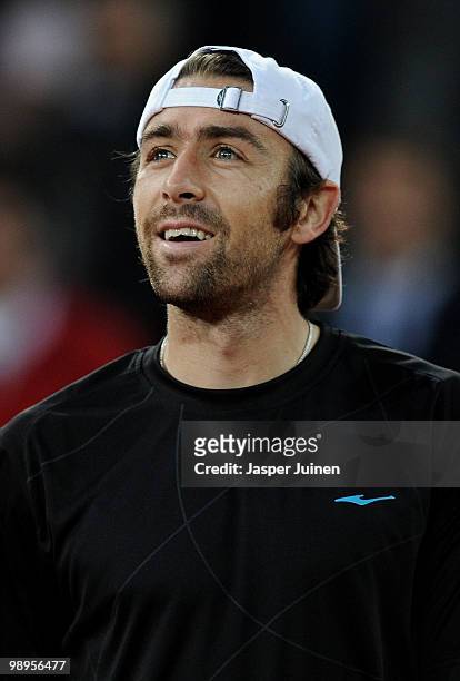 Benjamin Becker of Germany smiles after winning his first round match against Carlos Moya of Spain during the Mutua Madrilena Madrid Open tennis...