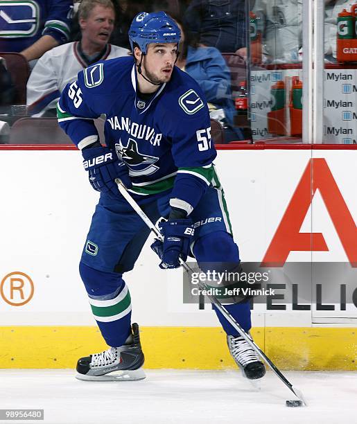 Shane O'Brien of the Vancouver Canucks skates up ice with the puck in Game Four of the Western Conference Semifinals against the Chicago Blackhawks...