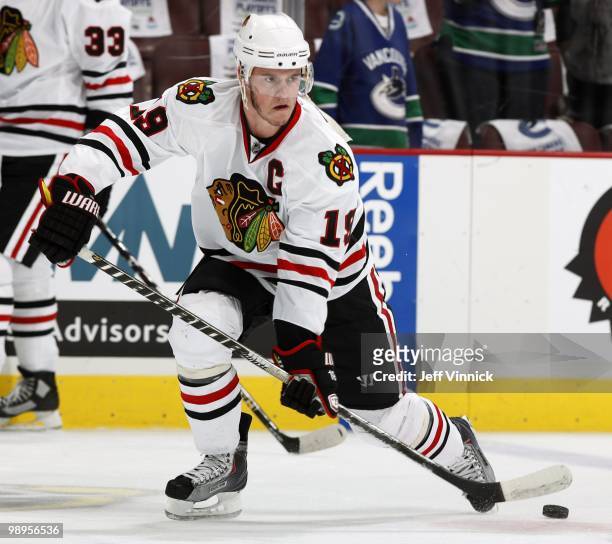 Jonathan Toews of the Chicago Blackhawks passes the puck up ice in Game Four of the Western Conference Semifinals against the Vancouver Canucks...