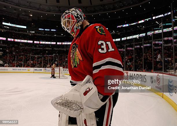 Antti Niemi of the Chicago Blackhawks skates to the corner during a break in the action against the Vancouver Canucks in Game Five of the Western...