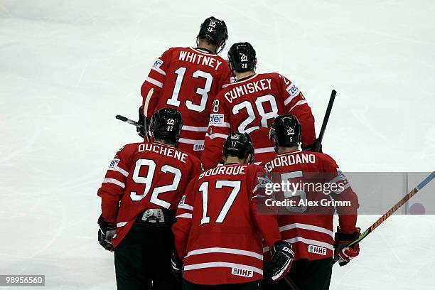 Marc Giordano, Rene Bourque, Matt Duchene, Kyle Cumiskey and Ray Whitney of Canada leave the ice after Marc Giordano scored his team's second goal...