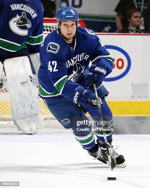 Kyle Wellwood of the Vancouver Canucks skates up ice with the puck in Game Four of the Western Conference Semifinals against the Chicago Blackhawks...