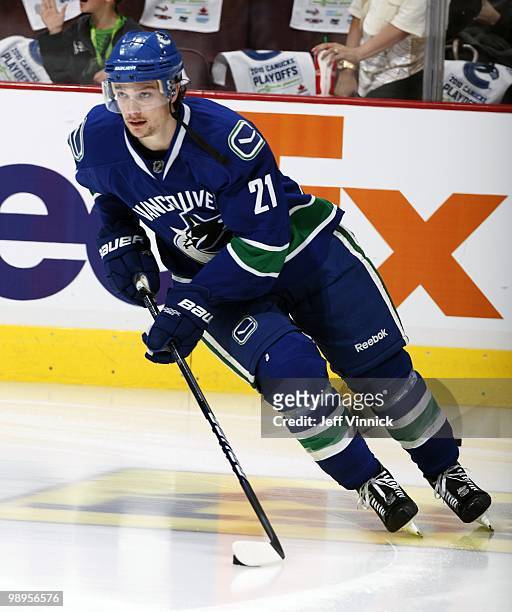 Mason Raymond of the Vancouver Canucks skates up ice with the puck in Game Four of the Western Conference Semifinals against the Chicago Blackhawks...
