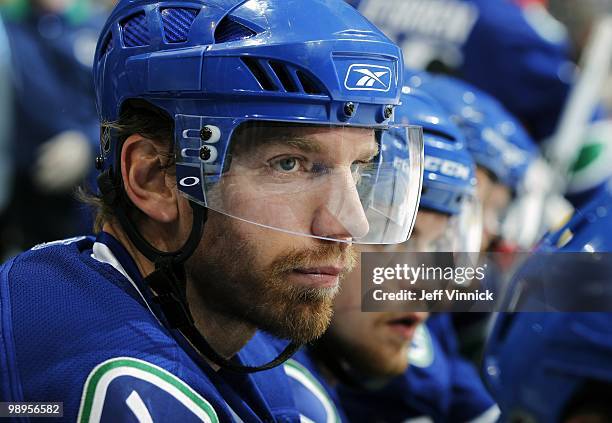 Mikael Samuelsson of the Vancouver Canucks looks on from the bench in Game Four of the Western Conference Semifinals against the Chicago Blackhawks...