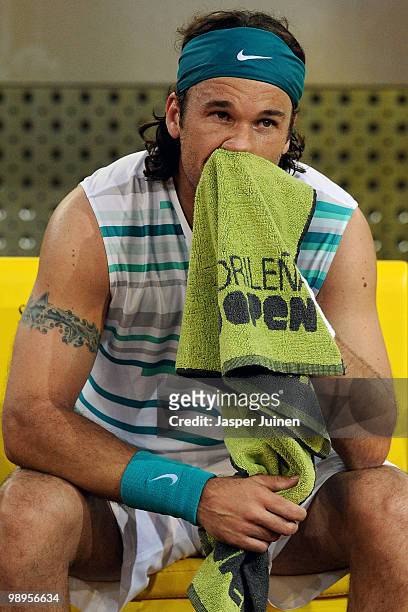 Carlos Moya of Spain during a break in his first round match against Benjamin Becker of Germany during the Mutua Madrilena Madrid Open tennis...
