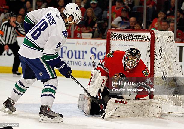 Antti Niemi of the Chicago Blackhawks stops a shot by Steve Bernier of the Vancouver Canucks in Game Five of the Western Conference Semifinals during...